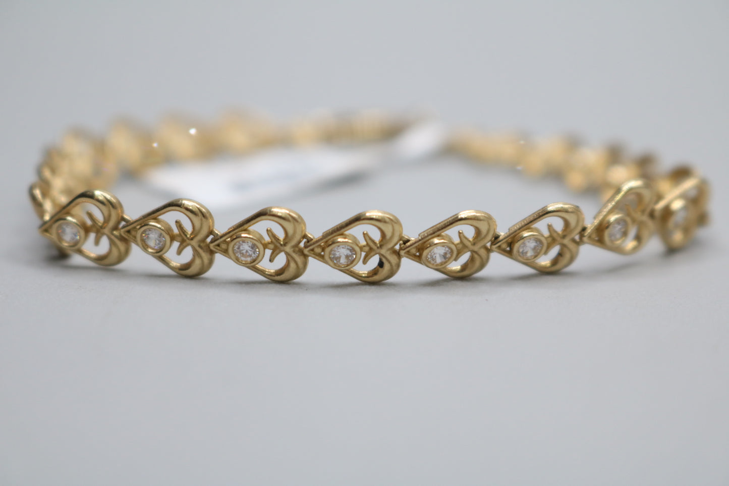 10k Yellow Gold Heart Fancy Lady's Bracelet w/clear stones (Length 7")