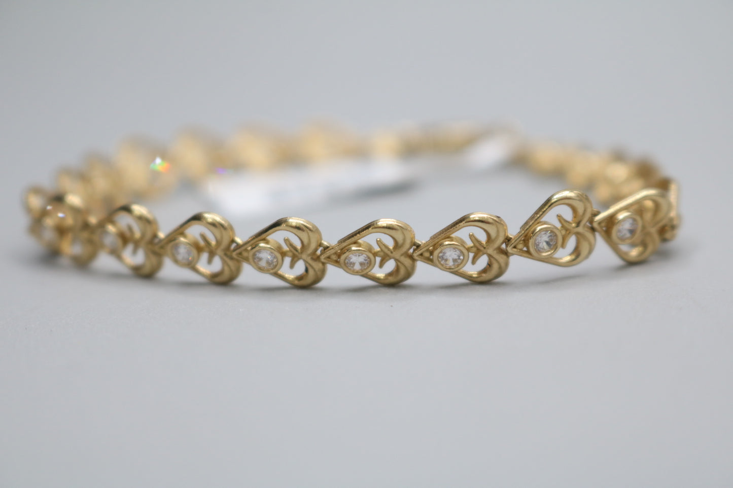 10k Yellow Gold Heart Fancy Lady's Bracelet w/clear stones (Length 7")