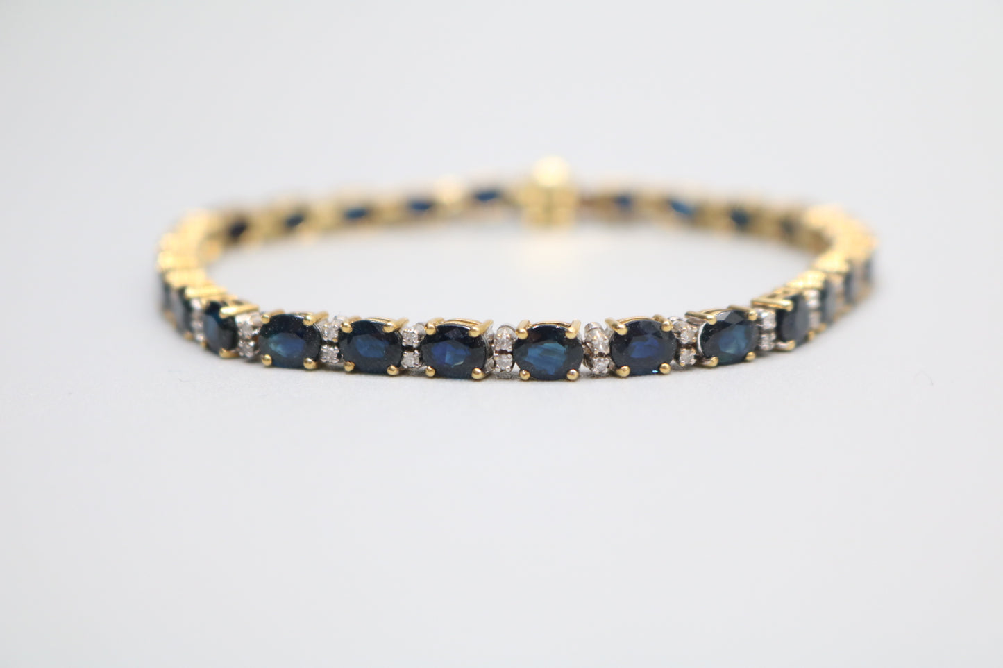 18K Yellow Gold Oval Cut Natural Sapphire and Diamond Tennis-Style Bracelet (Length 7.5 Inches) (Local Pick-Up Only)