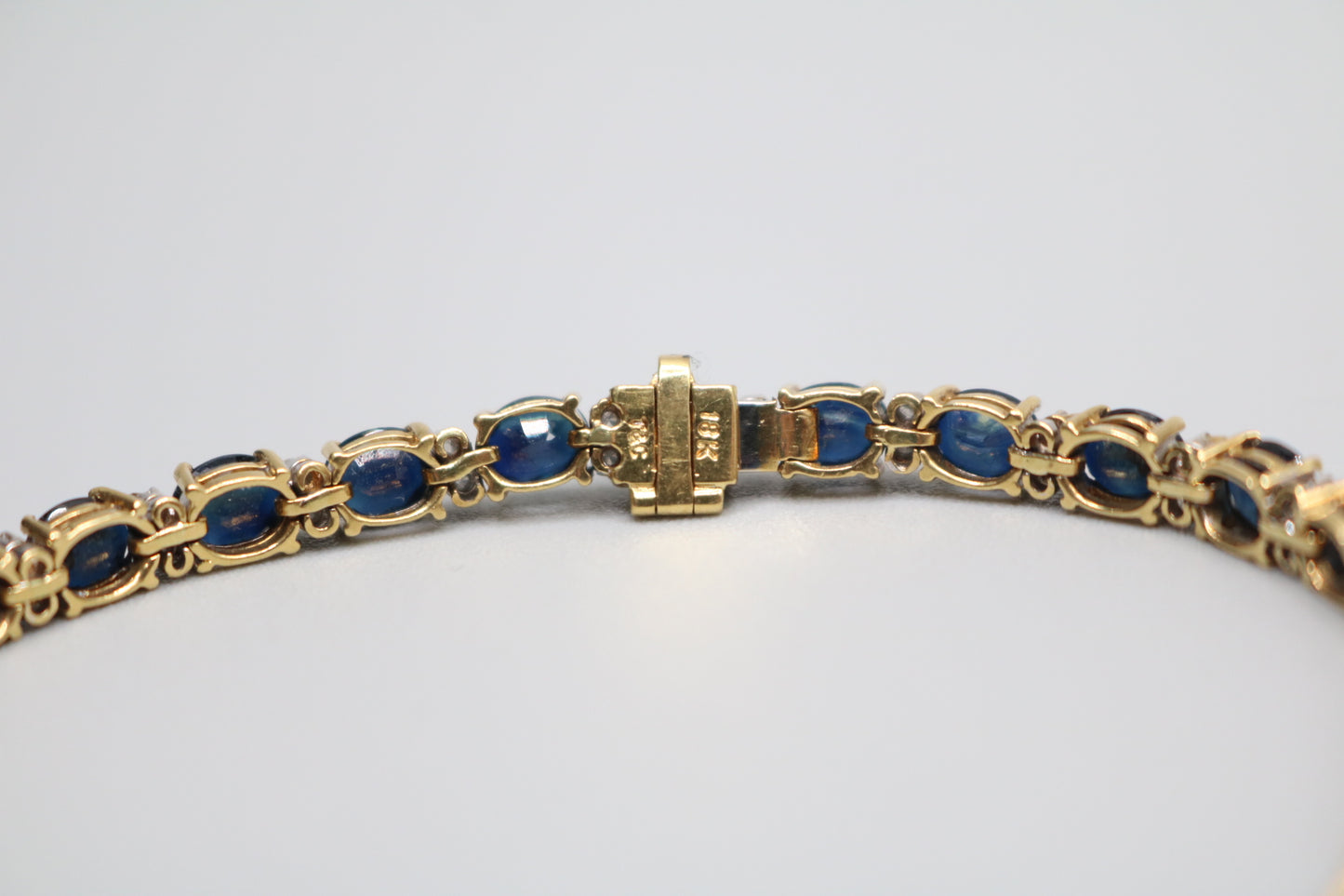 18K Yellow Gold Oval Cut Natural Sapphire and Diamond Tennis-Style Bracelet (Length 7.5 Inches) (Local Pick-Up Only)