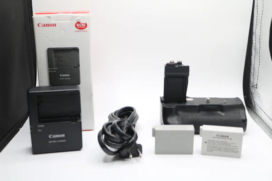 Pre-owned Canon Charger And Grip Extension Combo