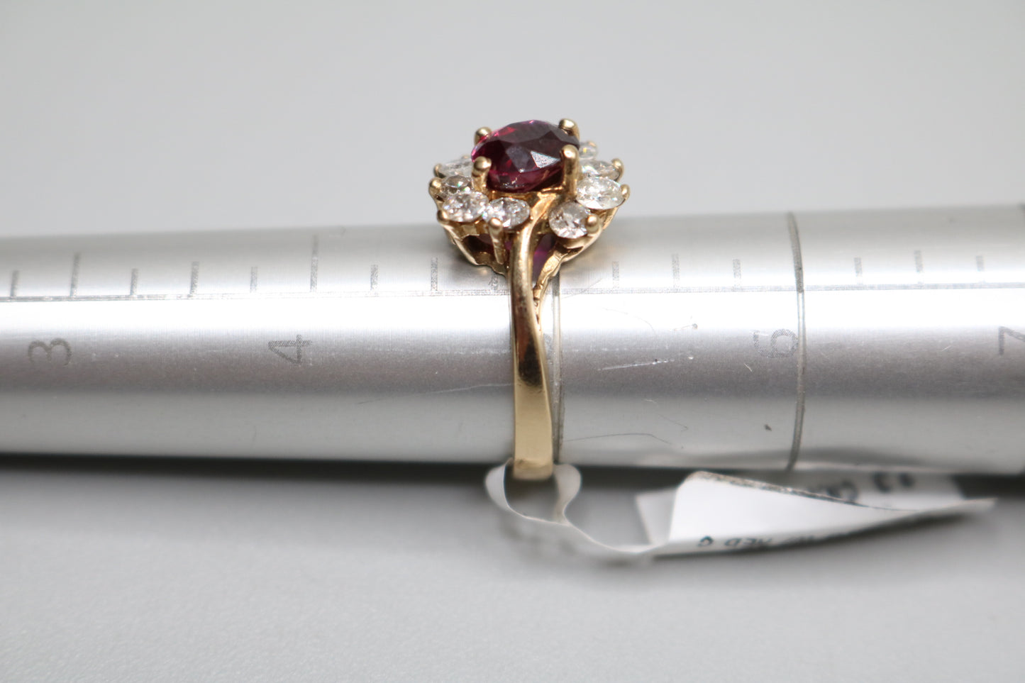 10K Yellow Gold Diamond Halo Ring with center Ruby (Size 5)