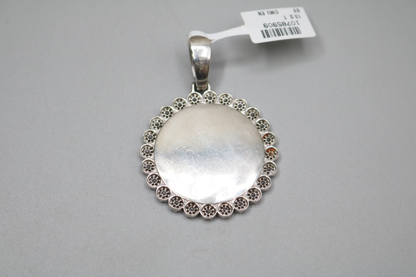 Sterling Silver Circular Charm with Clear Stones