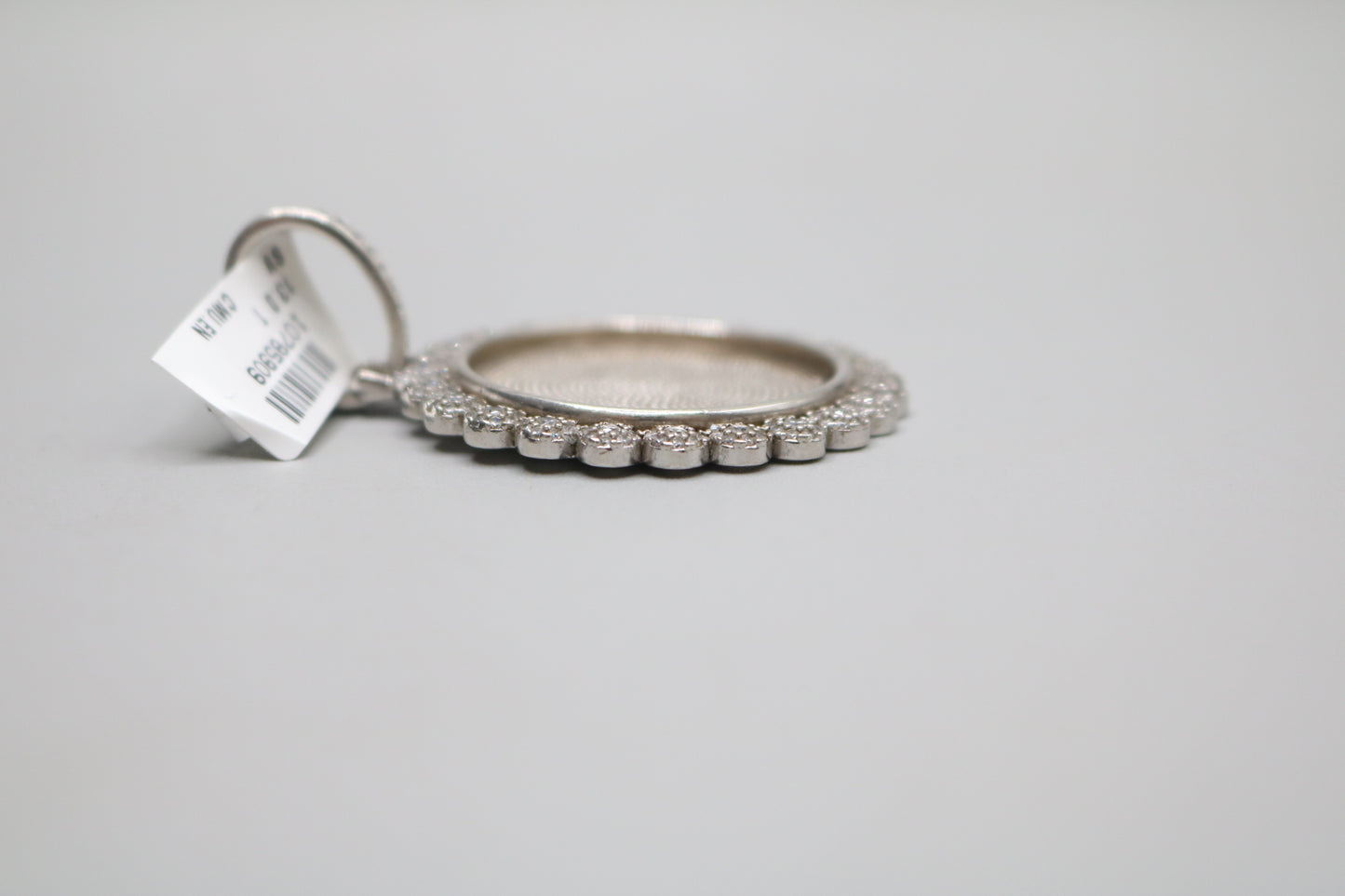 Sterling Silver Circular Charm with Clear Stones