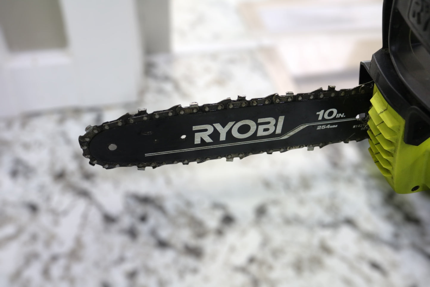 Ryobi P546 Chainsaw with Battery and Charger (Local Pick-Up Only)