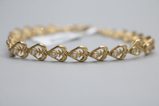 10k Yellow Gold Heart Fancy Lady's Bracelet w/clear stones (Length 7")