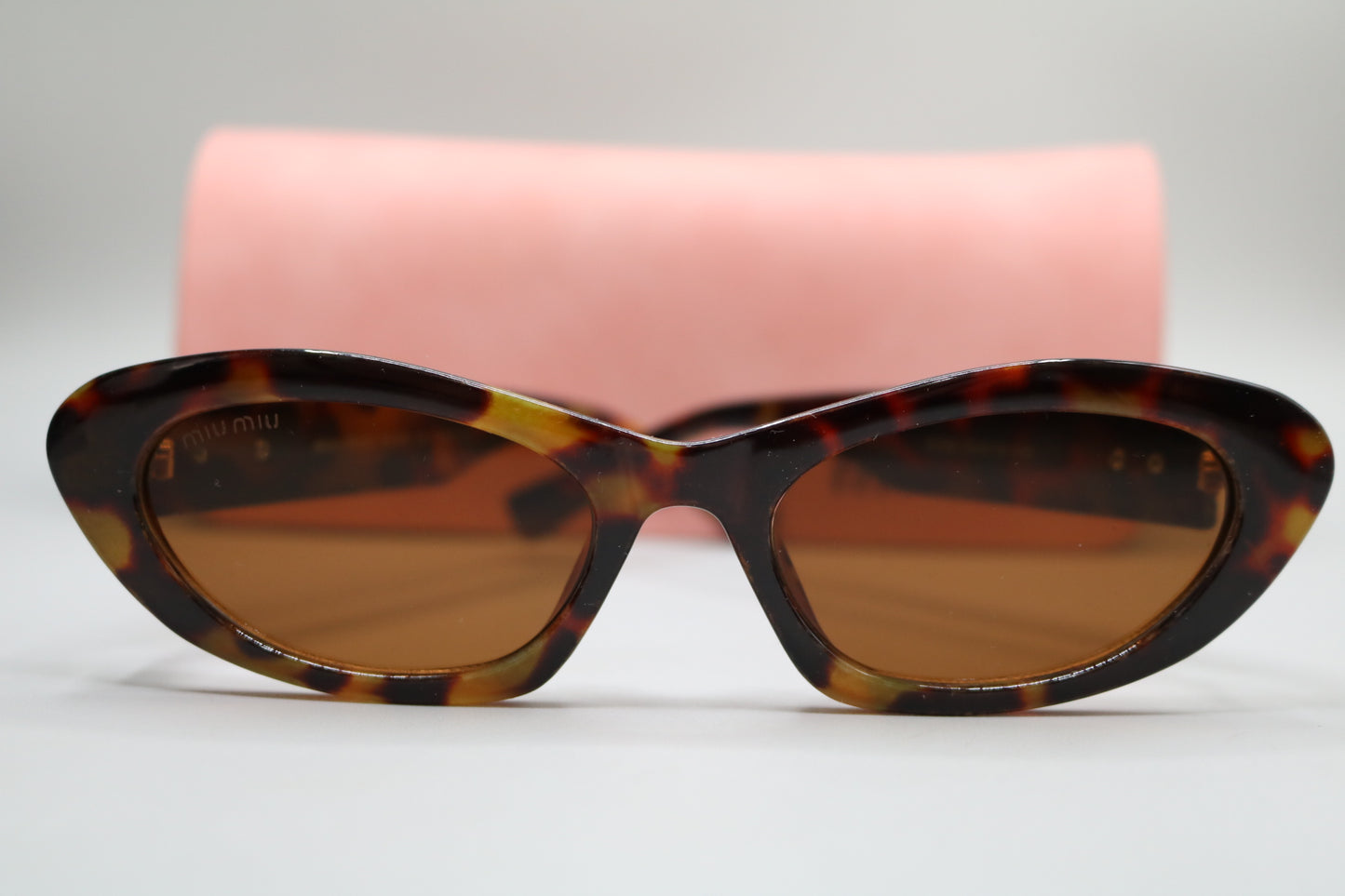 Miu Miu MU 09YS Honey Havana/Dark Brown (VAU0/6B) Sunglasses