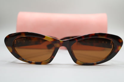Miu Miu MU 09YS Honey Havana/Dark Brown (VAU0/6B) Sunglasses