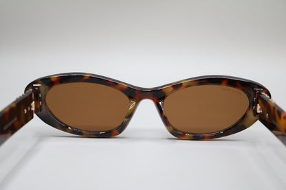 Miu Miu MU 09YS Honey Havana/Dark Brown (VAU0/6B) Sunglasses