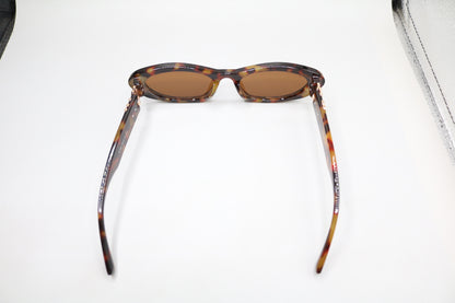 Miu Miu MU 09YS Honey Havana/Dark Brown (VAU0/6B) Sunglasses