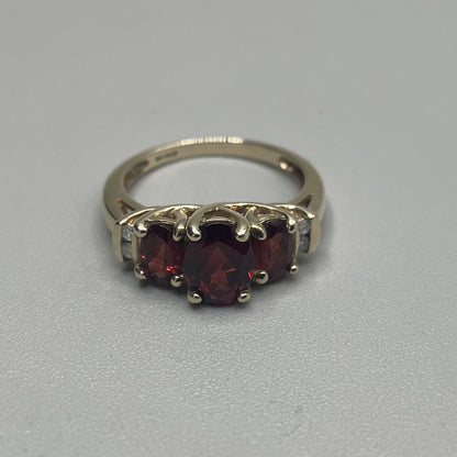 10K Yellow Gold Garnet & Diamond Ring (Diamond 0.08 CTW) (Size 7 1/4)