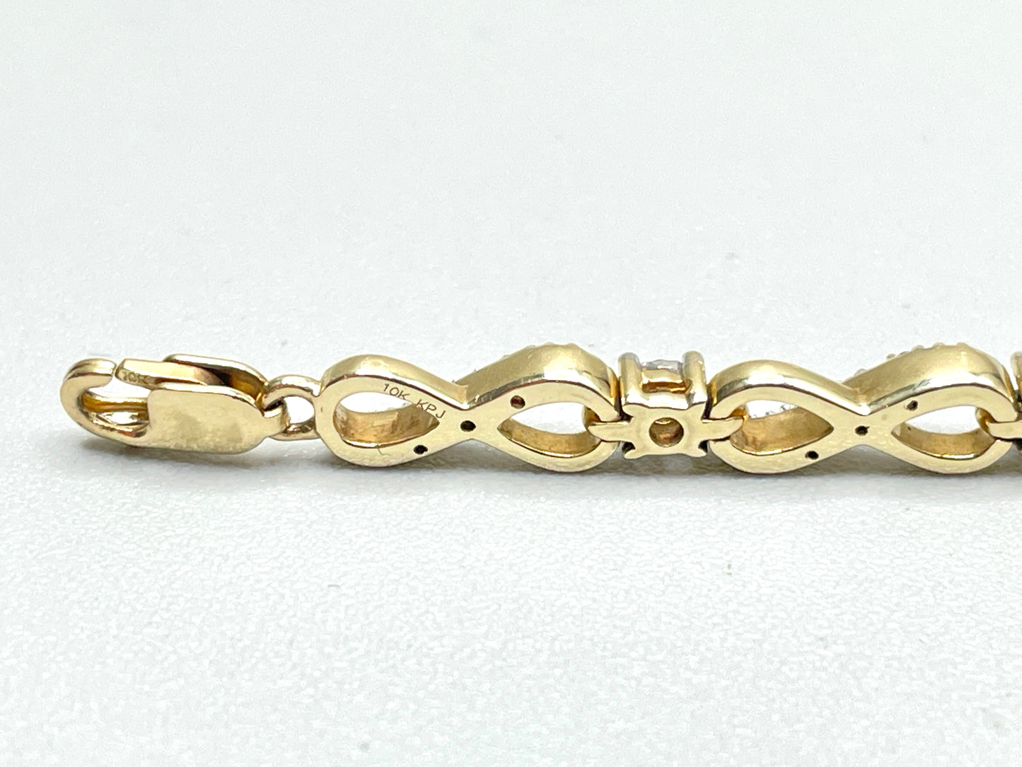 10K Yellow Gold Infinity Link Diamond Tennis Bracelet (0.315 CTW) (7.25 Inches)