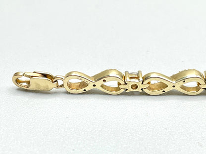 10K Yellow Gold Infinity Link Diamond Tennis Bracelet (0.315 CTW) (7.25 Inches)