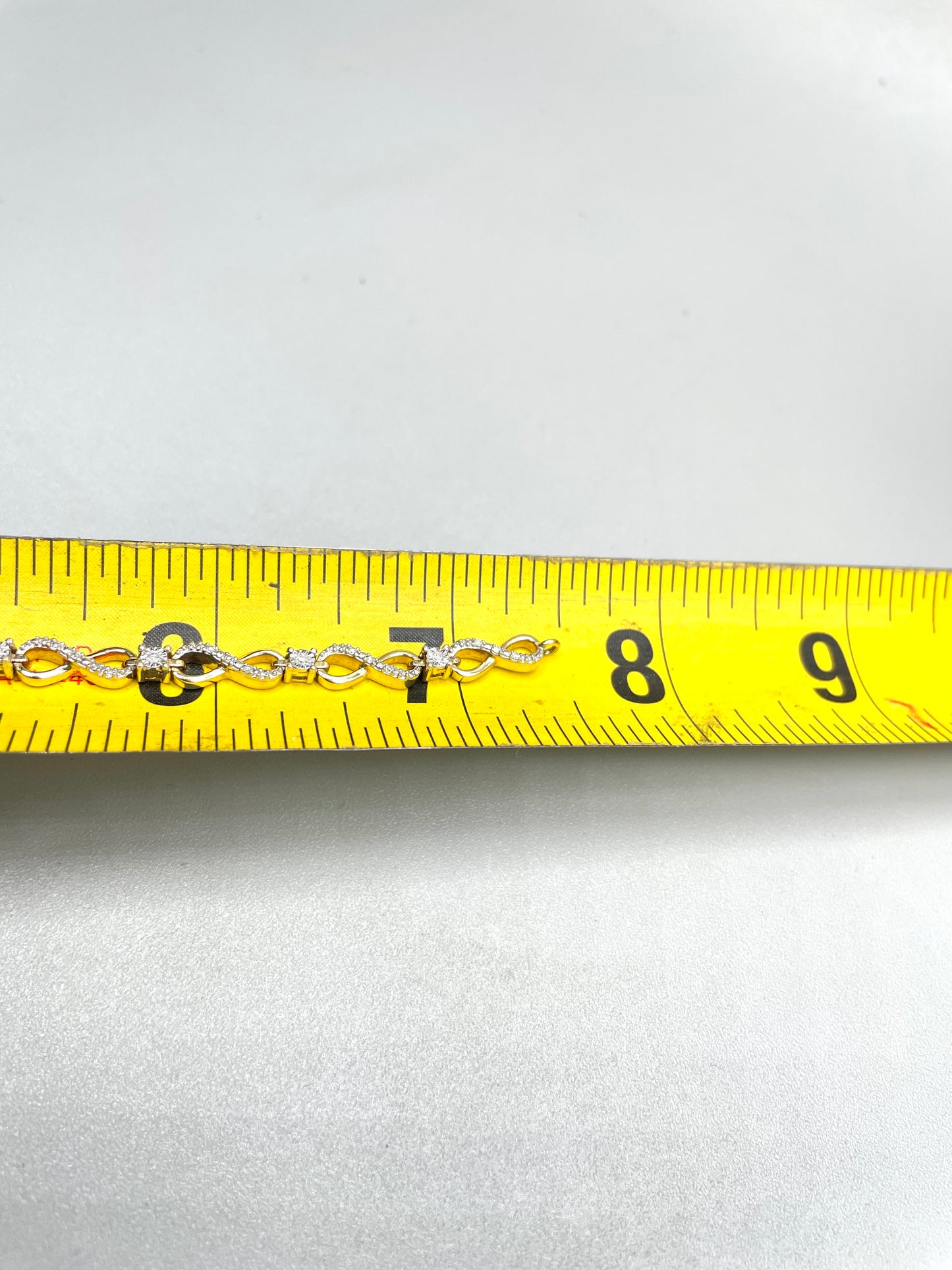 10K Yellow Gold Infinity Link Diamond Tennis Bracelet (0.315 CTW) (7.25 Inches)