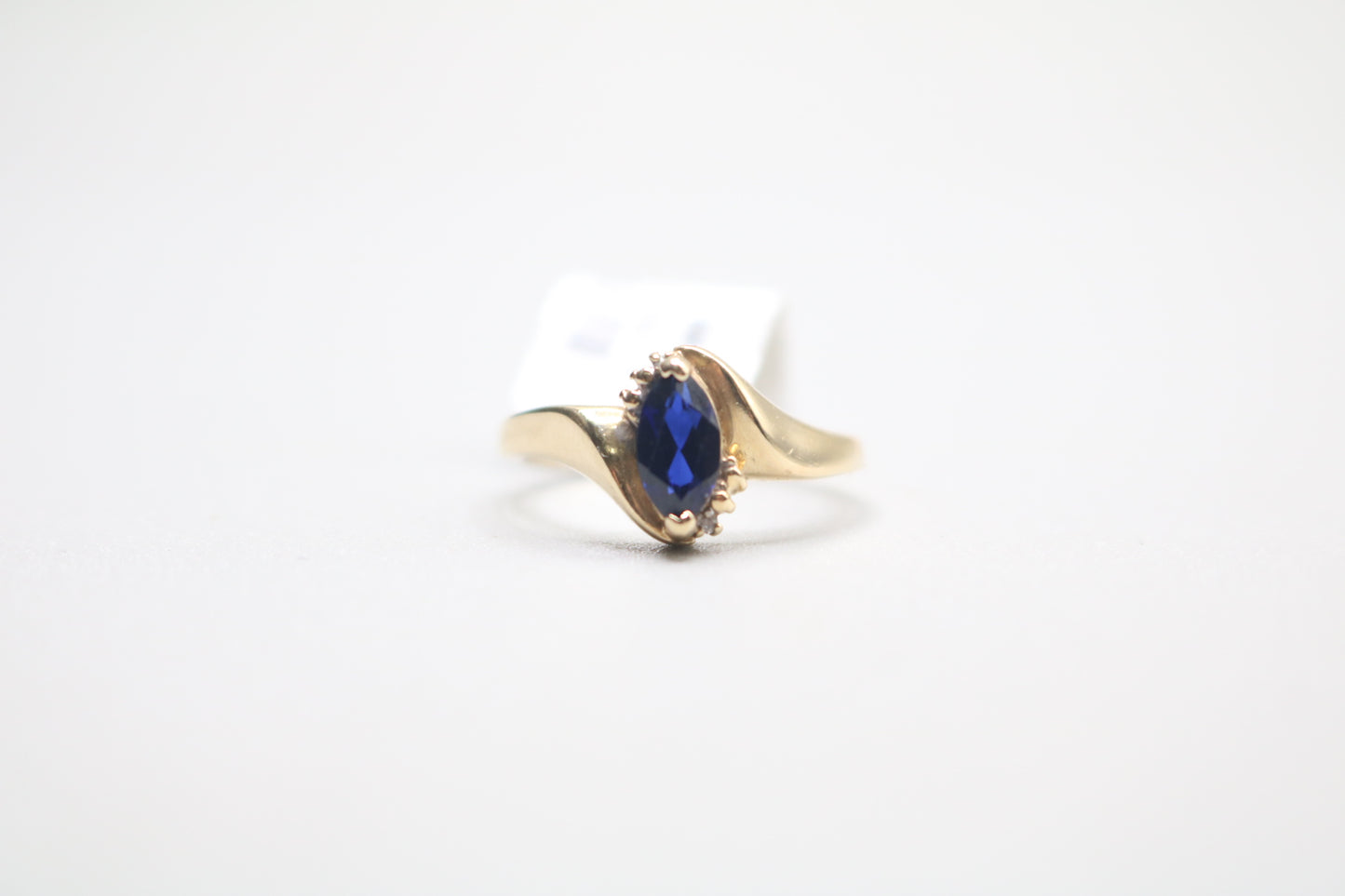 10k Yellow Gold Blue Stone Bypass Ring (Size 6 1/2)