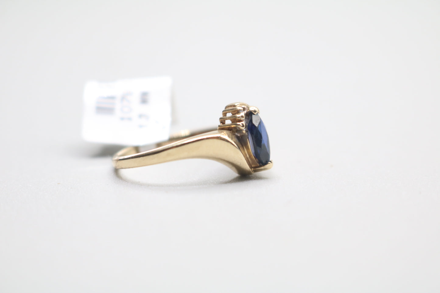 10k Yellow Gold Blue Stone Bypass Ring (Size 6 1/2)