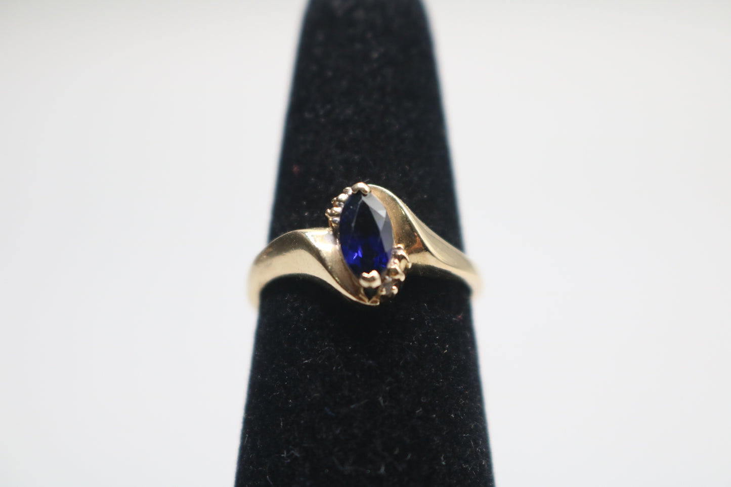 10k Yellow Gold Blue Stone Bypass Ring (Size 6 1/2)