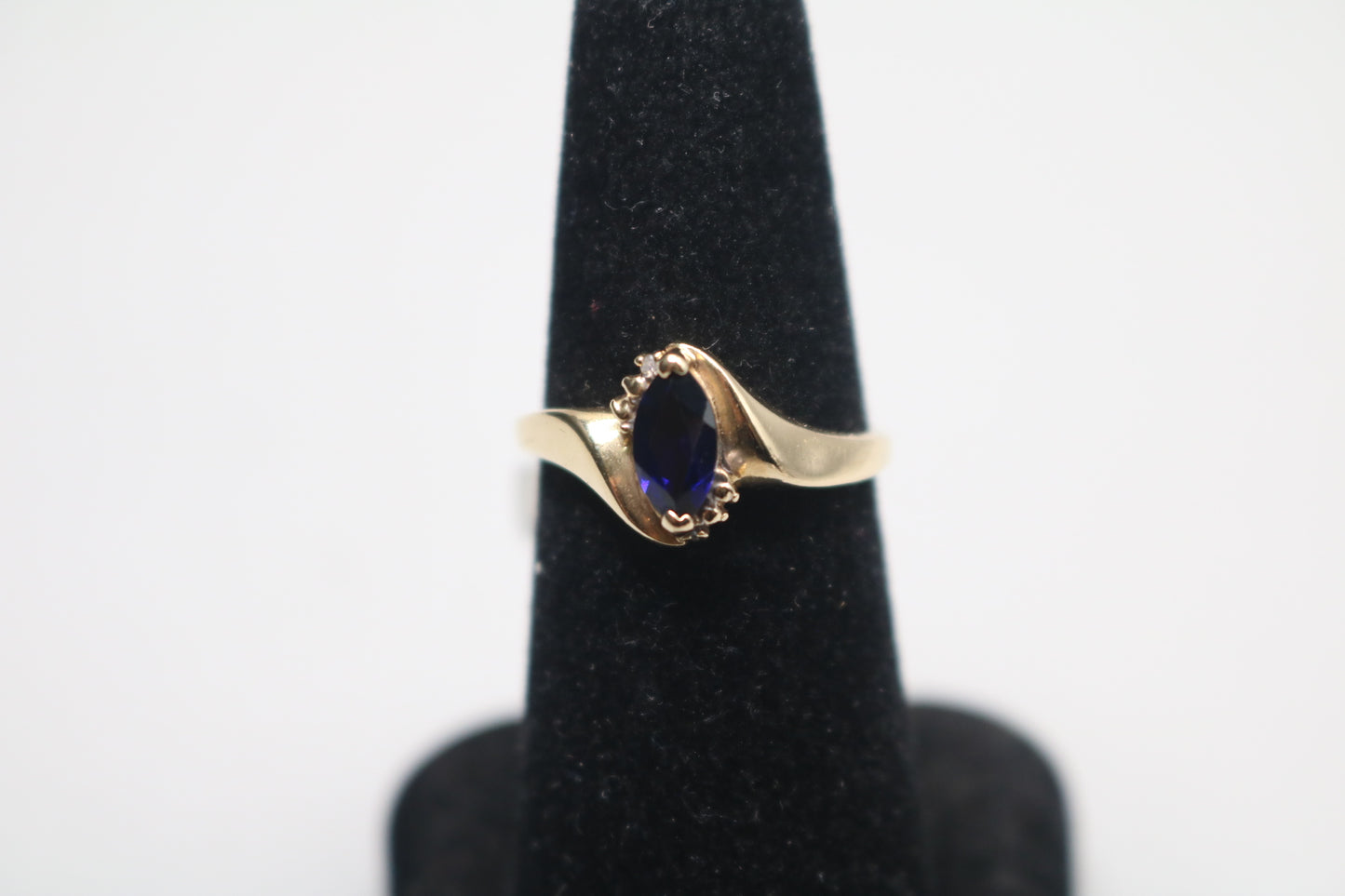 10k Yellow Gold Blue Stone Bypass Ring (Size 6 1/2)