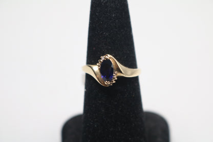 10k Yellow Gold Blue Stone Bypass Ring (Size 6 1/2)
