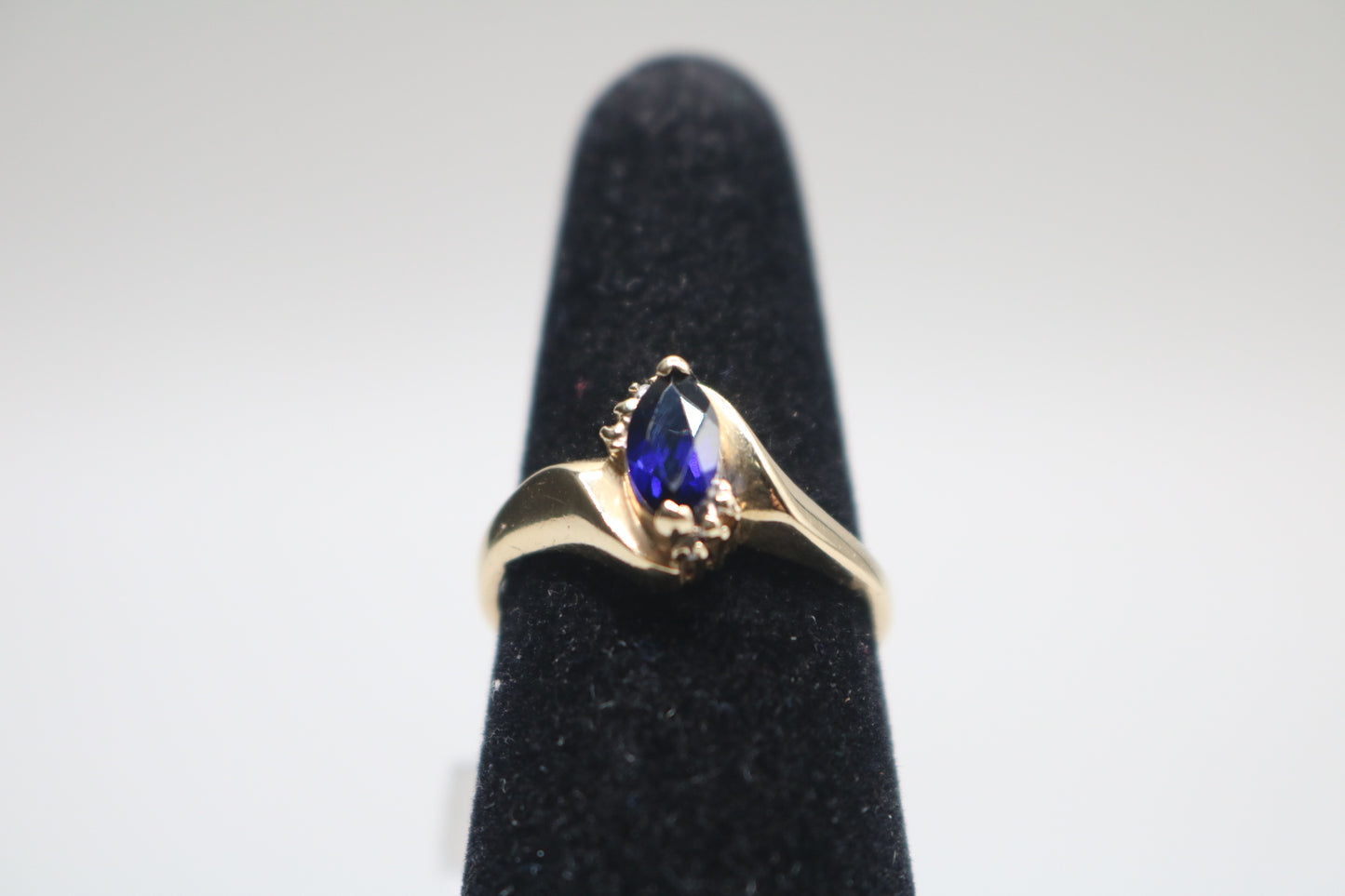 10k Yellow Gold Blue Stone Bypass Ring (Size 6 1/2)