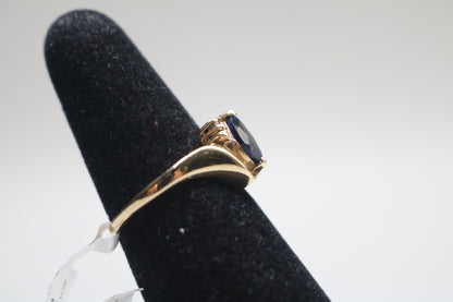 10k Yellow Gold Blue Stone Bypass Ring (Size 6 1/2)