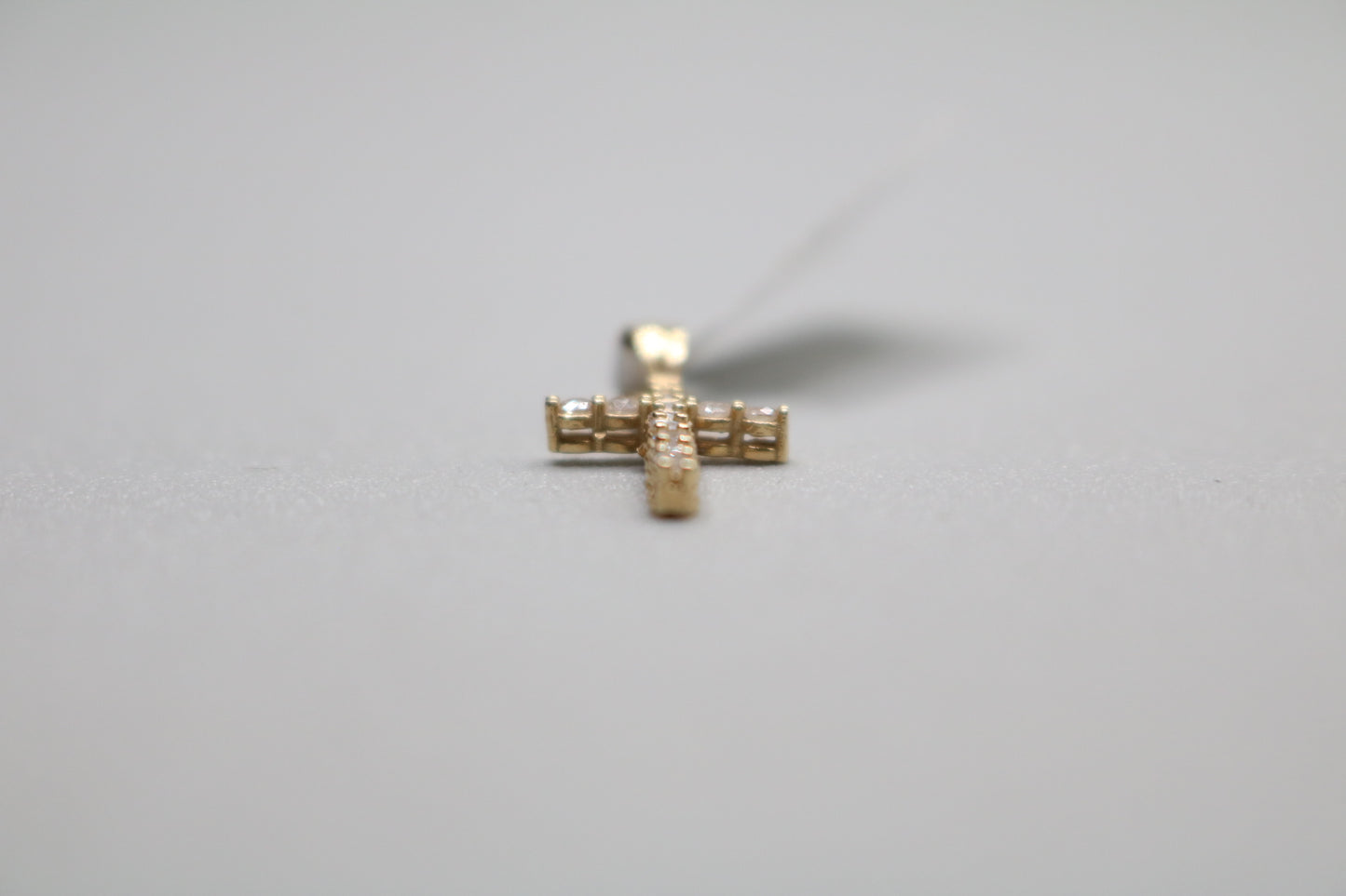 14k Yellow Gold Clear Stone Cross Charm