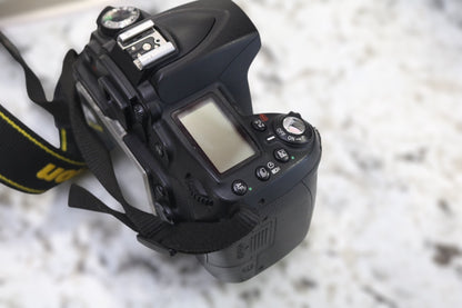 Nikon D90 Camera Body with an Aftermarket Charger