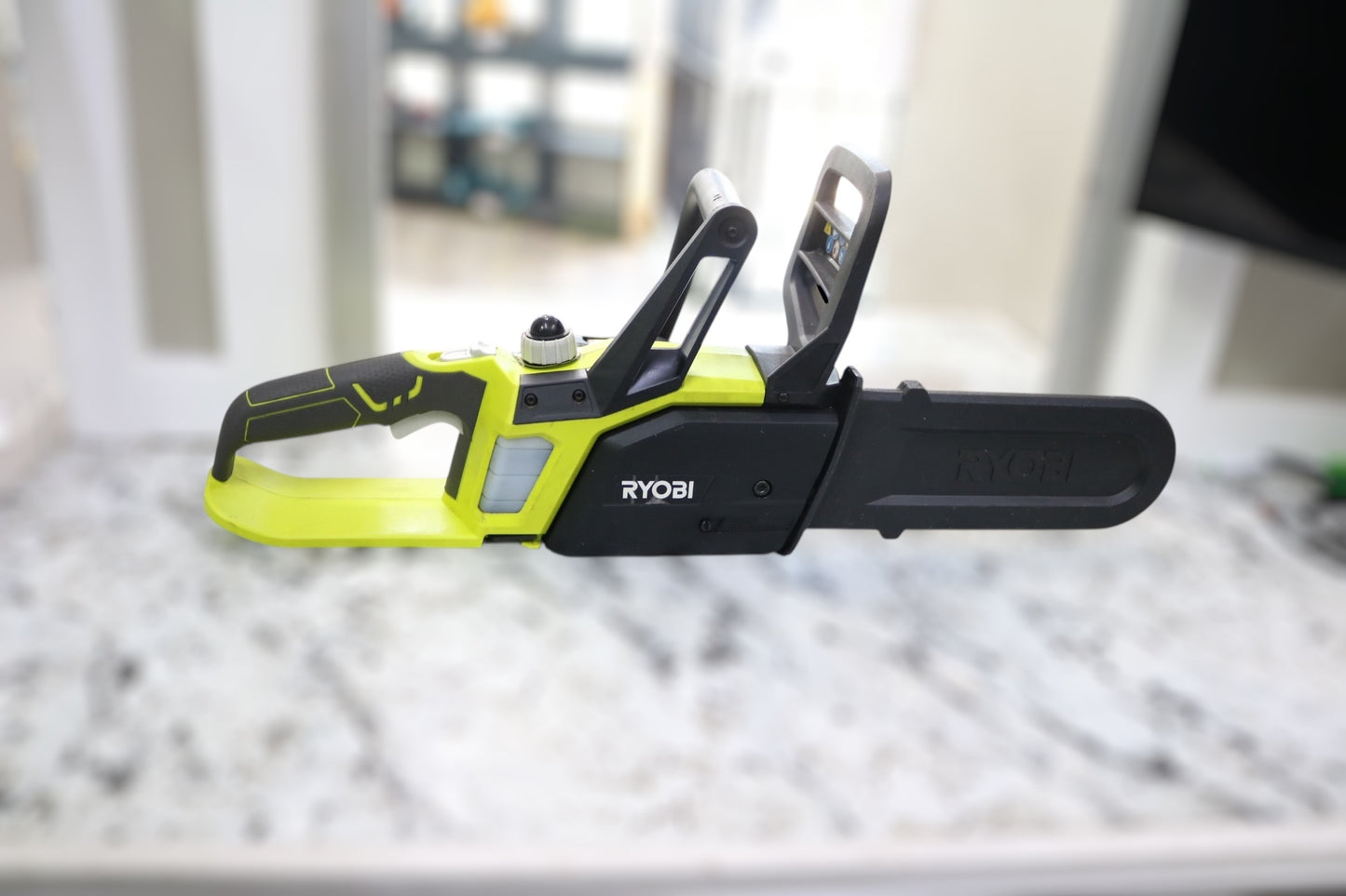 Ryobi P546 Chainsaw with Battery and Charger (Local Pick-Up Only)
