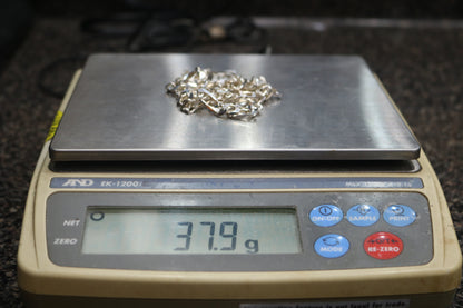 Pre-owned Silver Figaro Chain (24 Inches)