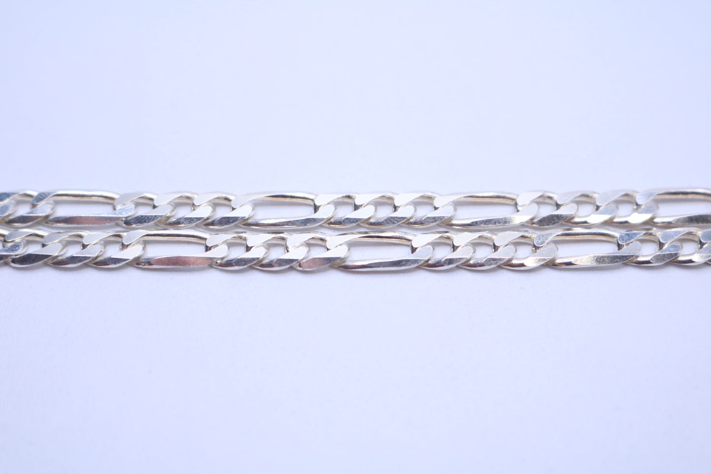 Pre-owned Silver Figaro Chain (24 Inches)