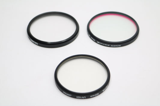 UV lenses Hoya 52mm, Camulet 58mm, and Promaster 58mm
