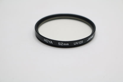 UV lenses Hoya 52mm, Camulet 58mm, and Promaster 58mm