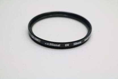 UV lenses Hoya 52mm, Camulet 58mm, and Promaster 58mm